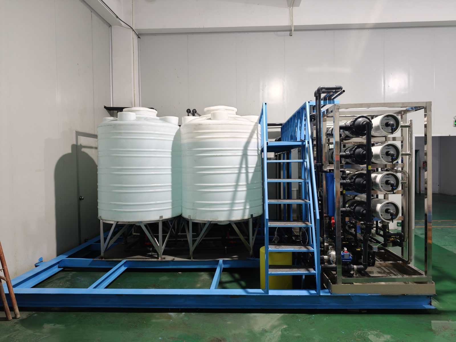 Commercial RO purification system on blue frame, front view